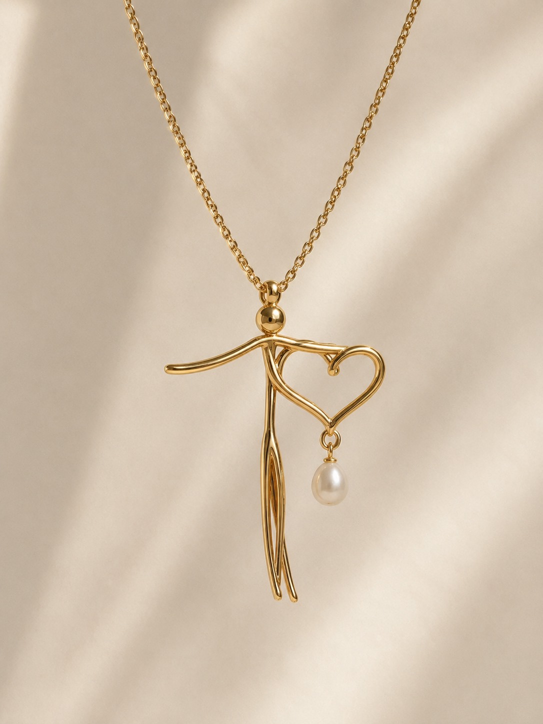Bleeding Heart Christ pendant in gold